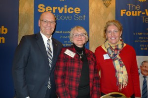 Pictured from left: Club President Tim Stadelman, Dean Kate VandenBosch and Rotarian Mary Kaminski