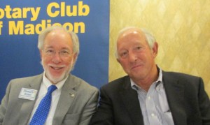 Brad Binkowski (right) seated here with Club President Ellsworth Brown